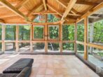 Vielseitiges Einfamilienhaus in ruhiger Hanglage und idyllischem Garten - OG Wintergarten Ansicht 1