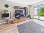 Modernisiertes Reihenmittelhaus mit kleinem Garten und zwei TG-Stellplätzen - Wohnbereich Ansicht 2
