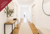 Moderne Erdgeschosswohnung mit Terrasse und Garten - Flur
