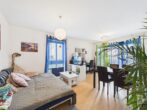 Vermietete 2-Zimmer-Wohnung mit Süd-West-Terrasse und Gartenanteil - Wohn-Essbereich Ansicht 1