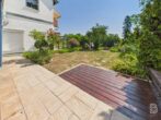 Helle 2-Zimmer-Wohnung mit Garage und herrlichem Weitblick - Terrasse und Garten Ansicht 1