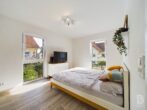 Moderne 3-Zimmer-Wohnung mit großem Balkon und Tiefgaragenstellplatz - Schlafzimmer Ansicht 1