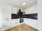 Moderne 3-Zimmer-Wohnung mit großem Balkon und Tiefgaragenstellplatz - Einbauküche
