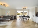 Moderne 3-Zimmer-Wohnung mit großem Balkon und Tiefgaragenstellplatz - Wohn-Esszimmer Ansicht 1