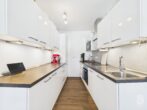 Moderne 3-Zimmer-Wohnung mit Balkon, Aufzug und Tiefgarage - Küche