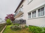 Solides 3-Familienhaus mit Garten, Doppelgarage und Entwicklungspotenzial in ruhiger Lage - Außenansicht Südseite