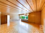Großzügiger Bungalow in ruhiger Lage und traumhaften Garten - Wohnzimmer