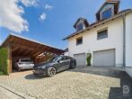 Großzügige 6-Zimmer-Wohnung mit Galerie und Carport - Außenansicht