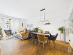 Hochwertige 2-Zimmer-Wohnung mit Südterrasse, Einbauküche und hochwertiger Ausstattung - Ess- und Wohnbereich Ansicht 1