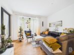 Hochwertige 2-Zimmer-Wohnung mit Südterrasse, Einbauküche und hochwertiger Ausstattung - Wohnbereich Ansicht 1
